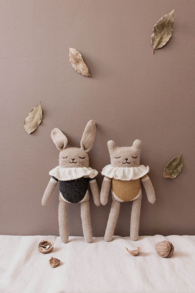
                
                    Load image into Gallery viewer, Bunny Knitted Soft Toy in Black Bodysuit
                
            