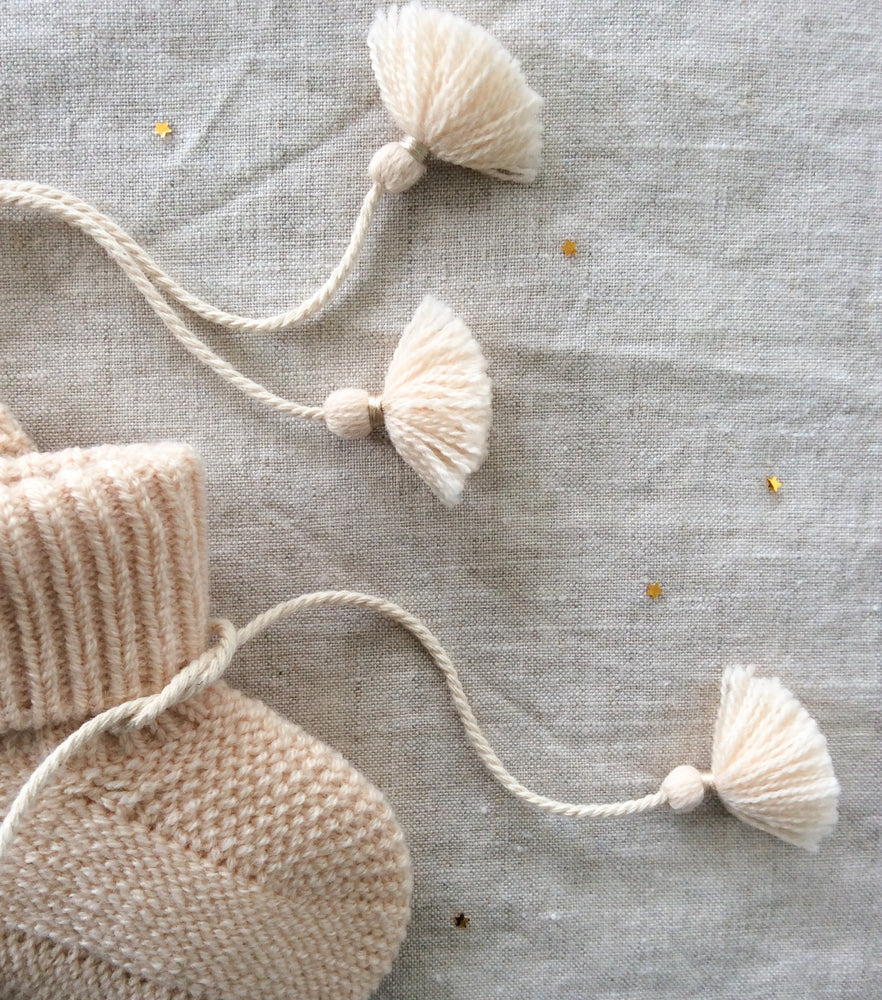 
                
                    Load image into Gallery viewer, Knitted Booties with Embroidered Pouch - Beige
                
            