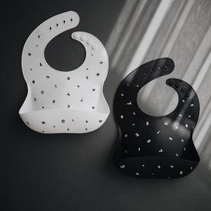 
                
                    Load image into Gallery viewer, Mushie Printed Silicone Bibs | Multiple Prints
                
            