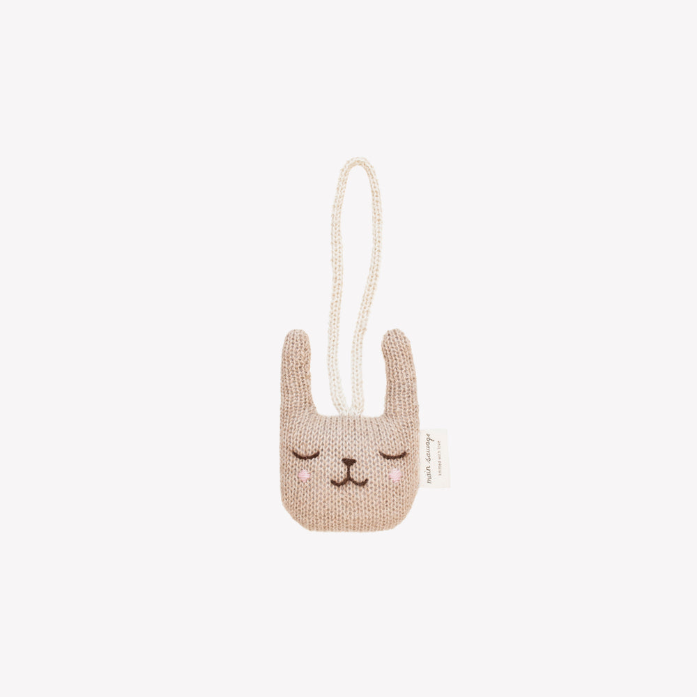 Rabbit Hanging Rattle by Main Sauvage