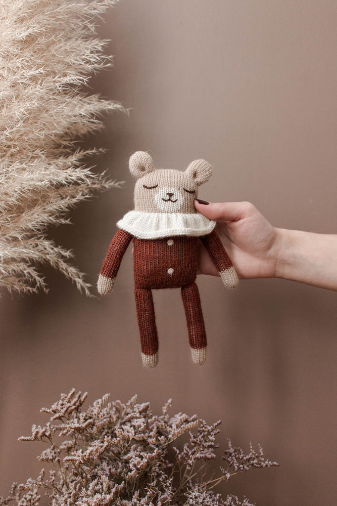 
                
                    Load image into Gallery viewer, Teddy Knitted Toy in Sienna Pyjamas
                
            